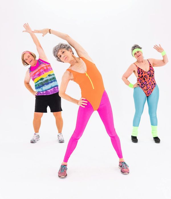 Energetic woman feeling great after a home workout.